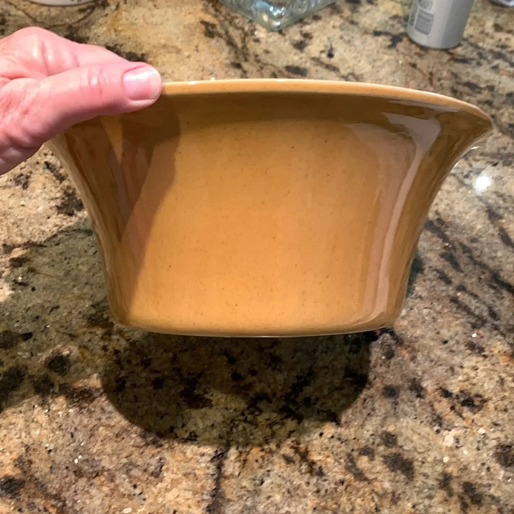 Crate & Barrel large bowl. Golden yellow.